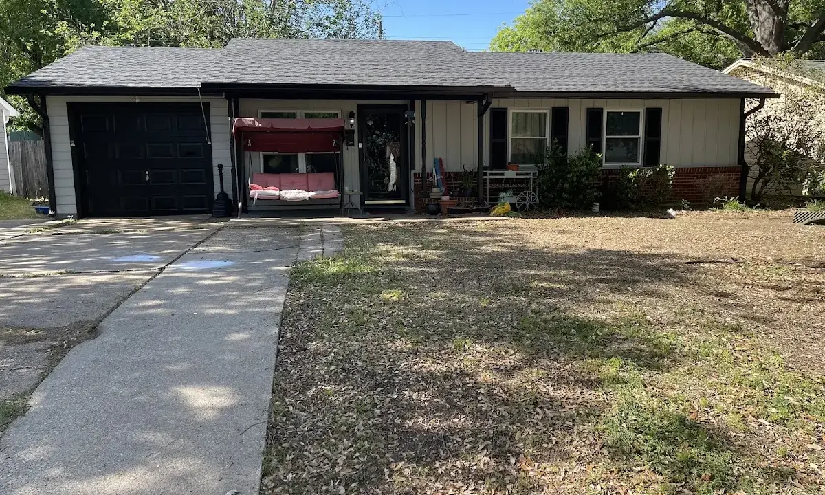 Asphalt Shingle Roof Repair crew at work on a residential roof in Florida Ridge